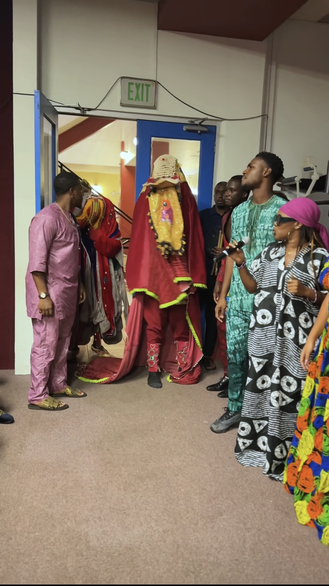 Adesoga performing with band